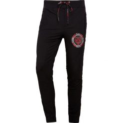 Plein Sport TROUSERS FLY AWAY Spodnie treningowe black. Czarne spodnie dresowe męskie Plein Sport, z bawełny. W wyprzedaży za 772.85 zł.