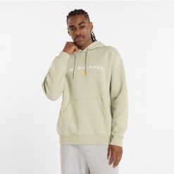 Bluza męska New Balance MT51516OVN – zielona. Zielone bluzy nierozpinane męskie New Balance, m, z aplikacjami, z bawełny, klasyczne, bez ramiączek, z kapturem. Za 189.99 zł.