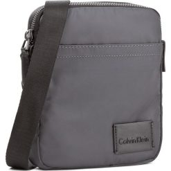 Saszetka CALVIN KLEIN - Ease Mini Reporter K50K503467 009. Saszetki męskie marki Calvin Klein. W wyprzedaży za 249.00 zł.
