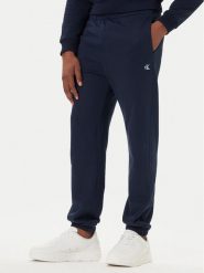 Calvin Klein Jeans Spodnie dresowe LV04RD241G Granatowy Regular Fit. Niebieskie spodnie dresowe męskie Calvin Klein Jeans, bez wzorów, z bawełny. Za 309.99 zł.