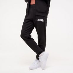 Spodnie dresowe męskie Puma Gym & Pilates. Czarne spodnie dresowe męskie Puma, bez wzorów, z bawełny. W wyprzedaży za 129.99 zł.