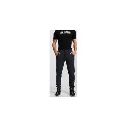 Spodnie dresowe męskie SPMD300 - denim melanż. Spodnie dresowe męskie marki 4f. W wyprzedaży za 99.99 zł.