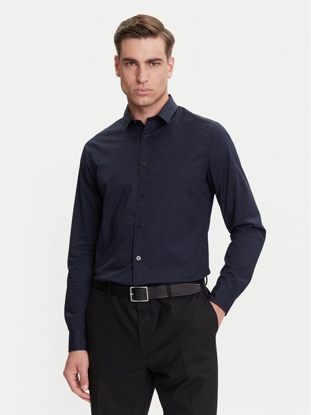 Calvin Klein Jeans Koszula J30J324614 Granatowy Slim Fit. Niebieskie koszule męskie Calvin Klein Jeans, m, bez wzorów, z bawełny, bez kołnierzyka, bez ramiączek. Za 219.99 zł.