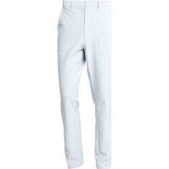 Adidas Golf ADIPRUE Chinosy offwhite. Białe długie spodnie sportowe męskie adidas Golf, z elastanu, sportowe. Za 419.00 zł.