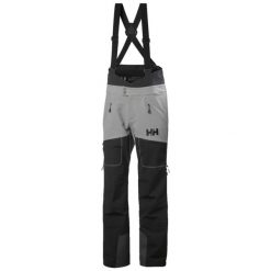 Spodnie narciarskie typu ogrodniczki Helly Hansen Odin BC Softshell. Niebieskie spodnie narciarskie i snowboardowe męskie Helly Hansen, bez wzorów, z softshellu, narciarskie. W wyprzedaży za 1,403.50 zł.