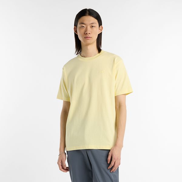 Koszulka męska New Balance MT41533PRC – żółta. Żółte t-shirty sportowe męskie New Balance, m, bez wzorów, z dresówki, klasyczne, bez ramiączek. Za 119.99 zł.