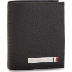 Mały Portfel Męski TOMMY HILFIGER - Th Plaque Ns Trifold AM0AM03637 002. Czarne portfele męskie Tommy Hilfiger, ze skóry. W wyprzedaży za 279.00 zł.