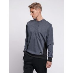 Bluza Hummel Tropper. Czarne bluzy nierozpinane męskie HUMMEL, l, bez wzorów, sportowe, bez ramiączek, bez kaptura. Za 201.00 zł.