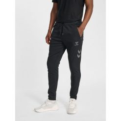 Spodnie treningowe Hummel Cima 2.0. Czarne spodnie dresowe męskie HUMMEL, bez wzorów. W wyprzedaży za 180.00 zł.