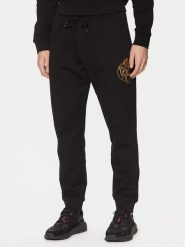 Armani Exchange Spodnie dresowe XM000218 AF10830 UC001 Czarny Regular Fit. Czarne spodnie dresowe męskie Armani Exchange, bez wzorów, z bawełny. Za 309.99 zł.