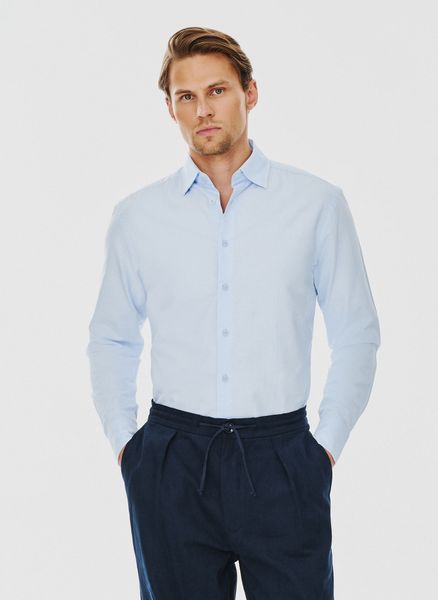 PAKO LORENTE – Niebieska bawełniana koszula męska. Niebieskie koszule męskie Pako Lorente, m, bez wzorów, z bawełny, bez kołnierzyka, bez ramiączek. Za 99.99 zł.