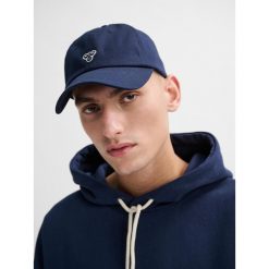 Czapka baseballowa Hummel. Niebieskie czapki męskie HUMMEL, na lato, bez wzorów, z bawełny, sportowe. Za 157.00 zł.