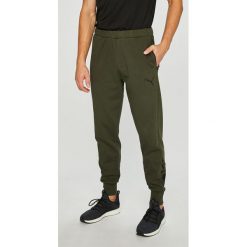 Puma - Spodnie. Szare długie spodnie sportowe męskie Puma, z bawełny. W wyprzedaży za 159.90 zł.