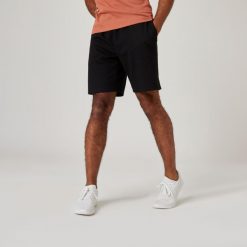 Spodenki fitness męskie Domyos 500 Essentials. Czarne szorty sportowe męskie DOMYOS, bez wzorów, z bawełny, sportowe. Za 49.99 zł.