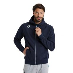 Kurtka z kapturem Arena Team Panel. Niebieskie kurtki męskie ARENA, bez wzorów, sportowe, bez ramiączek, z kapturem. Za 366.00 zł.