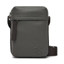 Saszetka Calvin Klein. Szare saszetki męskie Calvin Klein, bez wzorów, młodzieżowe, małe. Za 179.99 zł.