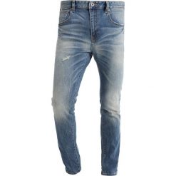 Scotch & Soda SKIM RIGHT HERE RIGHT NOW Jeansy Slim Fit blue denim. Niebieskie jeansy męskie Scotch & Soda, z bawełny. Za 549.00 zł.