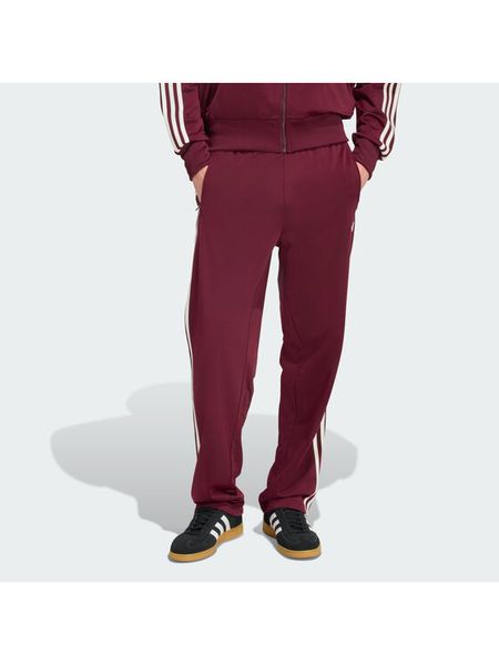 Adidas Spodnie dresowe KE1651 Bordowy Regular Fit. Czerwone spodnie dresowe męskie ADIDAS, bez wzorów, z dresówki. Za 278.99 zł.