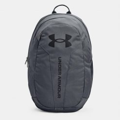 Plecak sportowy szkolny Under Armour Hustle Lite - 1364180-012. Szare plecaki męskie Under Armour, bez wzorów. W wyprzedaży za 99.00 zł.