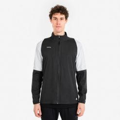 Kurtka piłkarska przeciwdeszczowa Kipsta CLR. Brązowe kurtki męskie KIPSTA, l, bez wzorów, z materiału, sportowe, bez ramiączek, bez kaptura. Za 219.99 zł.