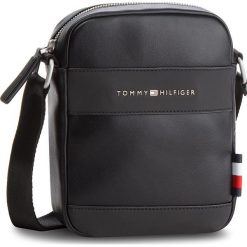 Saszetka TOMMY HILFIGER - Th City Mini Reporter AM0AM03582 002. Czarne saszetki męskie marki Tommy Hilfiger, ze skóry ekologicznej, młodzieżowe. Za 299.00 zł.