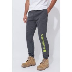 Spodnie męskie dresowe Carhartt Midweight Graphic Jogger. Szare spodnie dresowe męskie Carhartt, bez wzorów, z dresówki. Za 335.99 zł.