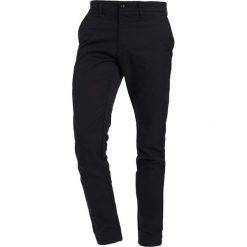 Carhartt WIP SID LAMAR Chinosy dark navy rinsed. Eleganckie spodnie męskie Carhartt WIP. Za 369.00 zł.