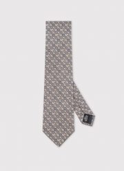 Beżowy krawat w mikrowzór. Brązowe krawaty i muchy męskie Pako Lorente, bez wzorów, z poliesteru. Za 99.99 zł.