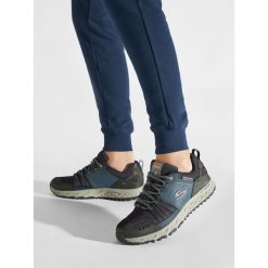 Trekkingi Skechers. Niebieskie buty trekkingowe męskie Skechers, bez wzorów, bez zapięcia, trekkingowe. Za 329.99 zł.