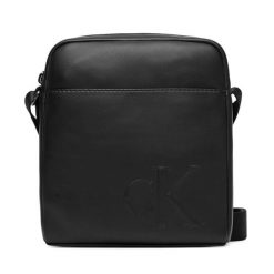 Saszetka Calvin Klein. Czarne saszetki męskie Calvin Klein, bez wzorów, małe. Za 209.99 zł.