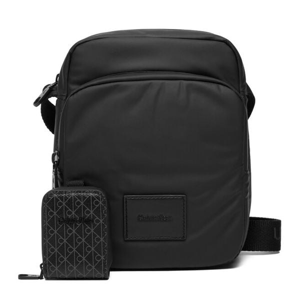 Saszetka Calvin Klein. Czarne saszetki męskie Calvin Klein, bez wzorów, małe. Za 369.99 zł.