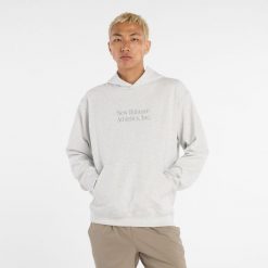 Bluza męska New Balance MT53925AHH – szara. Szare bluzy z kapturem męskie New Balance, m, z aplikacjami, z bawełny, z kapturem. Za 409.99 zł.