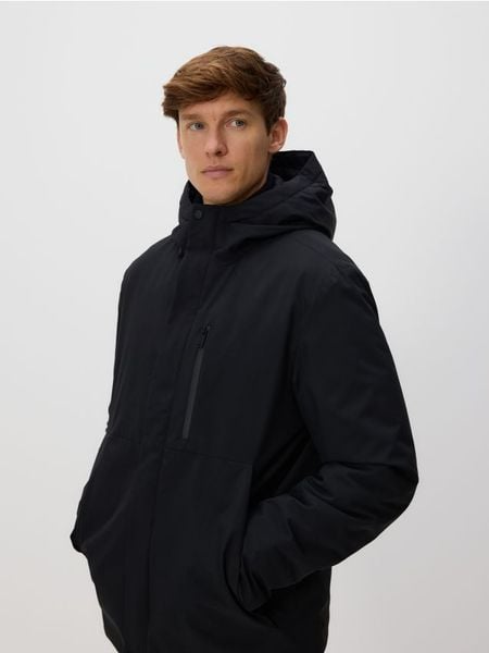 Gładka kurtka z kapturem - czarny. Czarne kurtki męskie Reserved, l, bez wzorów, z tkaniny, bez ramiączek, z kapturem. Za 329.99 zł.