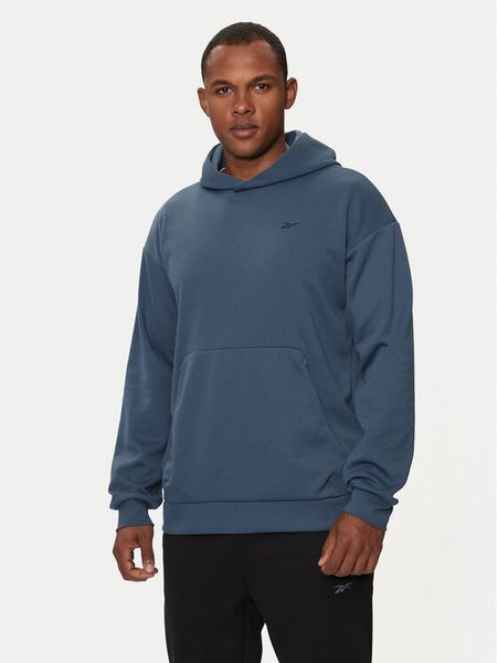 Reebok Bluza Strength Hoodie 100070154 Granatowy Regular Fit. Niebieskie bluzy nierozpinane męskie Reebok, m, bez wzorów, z syntetyku, bez ramiączek, bez kaptura. Za 149.99 zł.