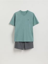 Dwuczęściowa piżama z bawełny - jasnozielony. Zielone piżamy męskie Reserved, l, bez wzorów, z bawełny, bez kołnierzyka, bez ramiączek. Za 99.99 zł.