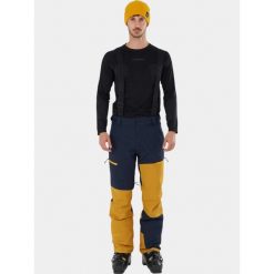 Spodnie Narciarskie Męskie Fundango Teak Colourblock. Niebieskie spodnie narciarskie i snowboardowe męskie Fundango, bez wzorów, z materiału, narciarskie. Za 499.90 zł.