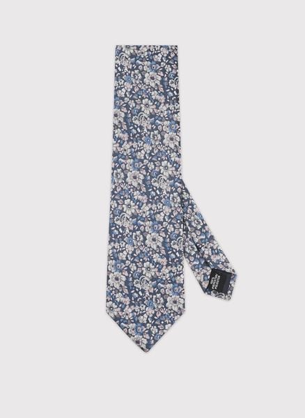 PAKO LORENTE - Niebieski krawat w kwiatowy wzór. Niebieskie krawaty i muchy męskie Pako Lorente, bez wzorów, z poliesteru. Za 99.99 zł.
