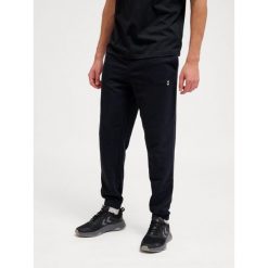 Spodnie do biegania Hummel Pulse. Czarne buty do biegania męskie HUMMEL, bez wzorów, z dresówki, bez zapięcia, do biegania. Za 170.00 zł.
