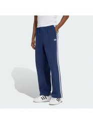 Adidas Spodnie dresowe adicolor Spacer Track KD4087 Granatowy Baggy Fit. Niebieskie spodnie dresowe męskie ADIDAS, bez wzorów, z dresówki. Za 349.99 zł.