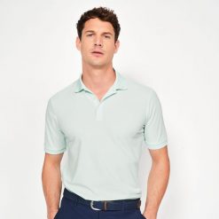 Koszulka polo do golfa z krótkim rękawem męska Inesis WW500. Niebieskie koszulki polo męskie INESIS, l, bez wzorów, z materiału, sportowe, bez kołnierzyka, bez ramiączek. Za 79.99 zł.