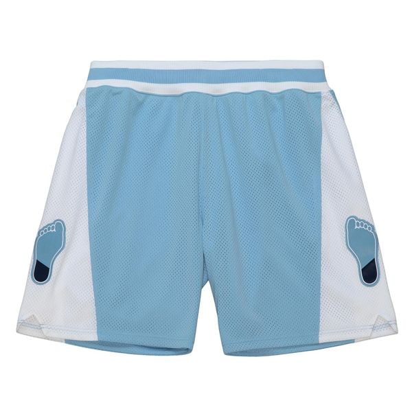 Szorty North Carolina Tarheels NCAA 1983. Niebieskie szorty męskie Mitchell & Ness, bez wzorów. Za 510.50 zł.