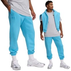 Spodnie dresowe męskie Under Armour joggery. Niebieskie spodnie dresowe męskie Under Armour, bez wzorów, z dresówki, długie. W wyprzedaży za 240.25 zł.