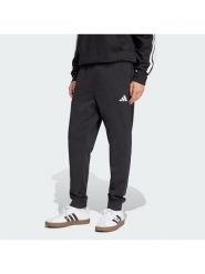 Adidas Spodnie dresowe Essentials Feel Cozy JE3854 Czarny Regular Fit. Czarne spodnie dresowe męskie ADIDAS, bez wzorów, z bawełny. Za 141.99 zł.
