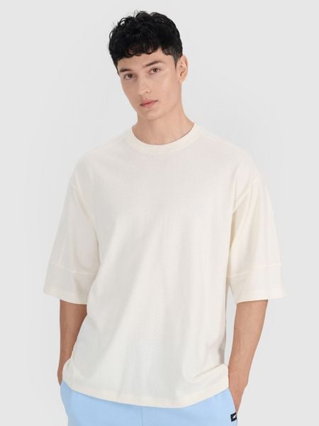 4F T-shirt oversize gładki męski - biały XXL. Białe t-shirty męskie 4f, m, bez wzorów, z bawełny, bez kołnierzyka, bez ramiączek. W wyprzedaży za 39.99 zł.