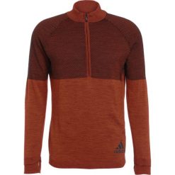 Adidas Performance CLIMAHEAT PRIMEKNIT Koszulka sportowa energy/black. T-shirty męskie adidas Performance. W wyprzedaży za 411.75 zł.