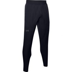Spodnie dresowe slim fit Under Armour Flex Woven. Czarne spodnie dresowe męskie Under Armour, bez wzorów, z dresówki. Za 375.00 zł.