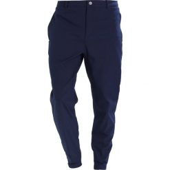 Puma Golf GOLF JOGGER Spodnie materiałowe peacoat. Długie spodnie sportowe męskie marki Puma Golf. Za 399.00 zł.