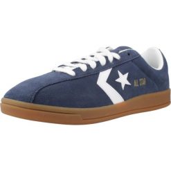 Buty CONVERSE CLASSIC TRAINER SUEDE Niebieski. Niebieskie buty zimowe męskie Converse, bez wzorów, z tkaniny, sportowe, bez obcasa, bez zapięcia. Za 342.30 zł.