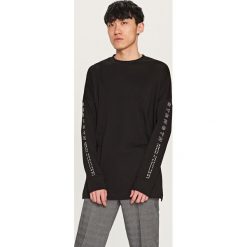 Bluza z nadrukiem - Czarny. Czarne bluzy nierozpinane męskie Reserved, z nadrukiem. Za 79.99 zł.