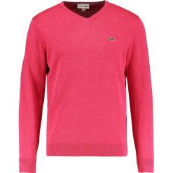 Lacoste Sweter medium red. Czerwone kardigany męskie marki Lacoste, z bawełny. W wyprzedaży za 343.20 zł.